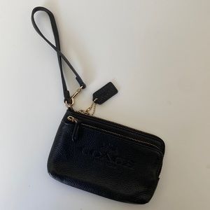 Coach black leather wristlet with authenticity tags